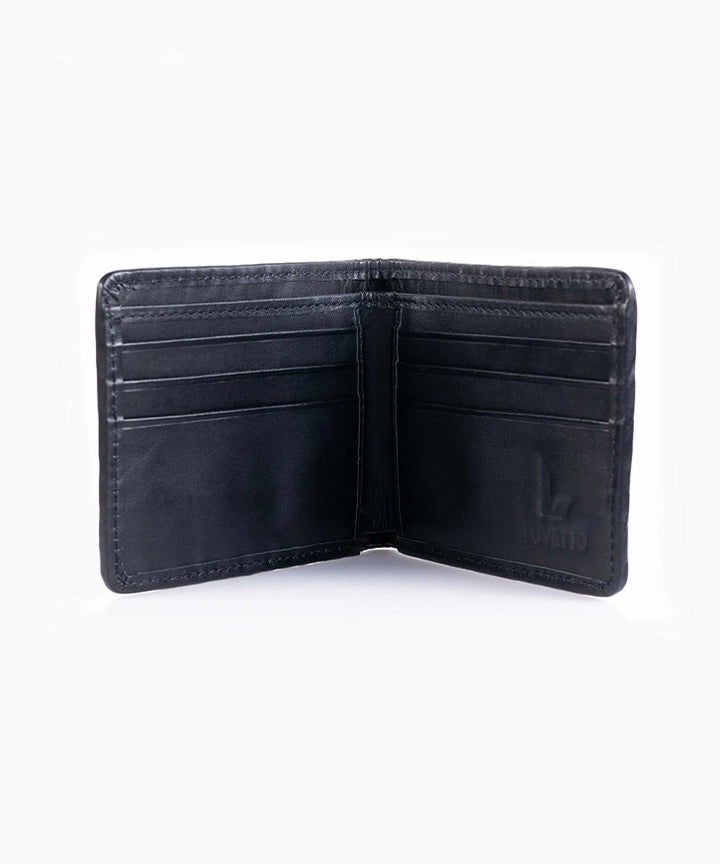 Interior of the Luvetto trifold wallet showing card slots and Serafil German thread stitching.